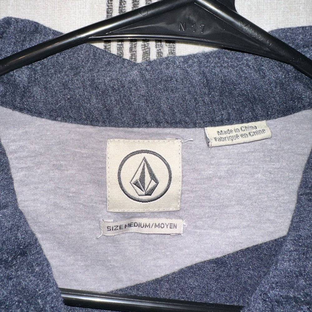 Blue Volcom polo style shirt. Size medium